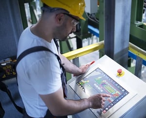 factory-worker-monitoring-industrial-machines-production-remotely-control-room