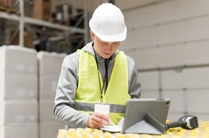 medium-shot-man-working-with-tablet