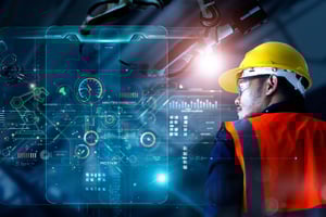 A man in yellow helmet looking at virtual data